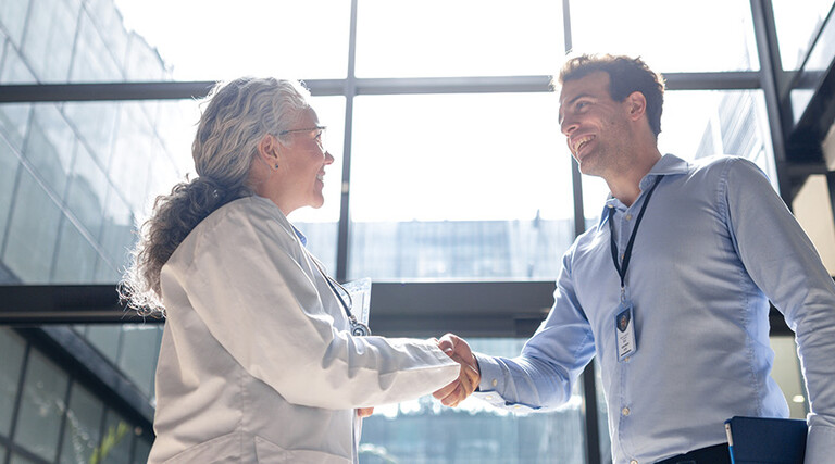 two people shaking hands