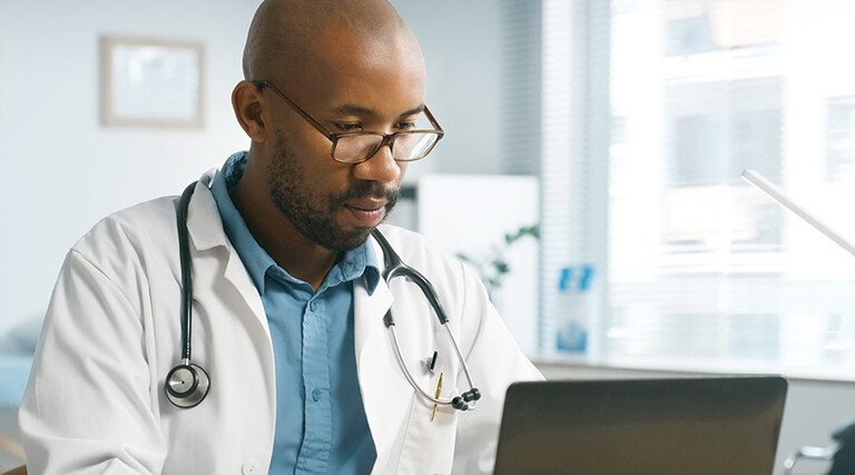 doctor on laptop