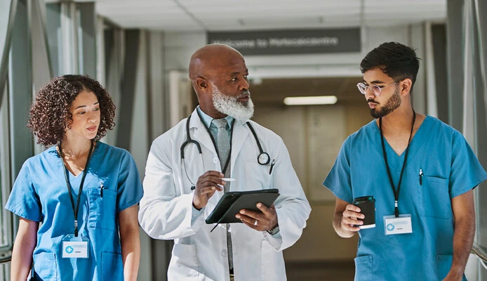 Doctor and nurses talking