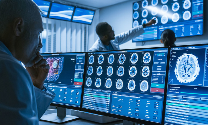 Healthcare Technology News Trends Healthtech Magazine - neurologists in a research center work on a brain tumor cure