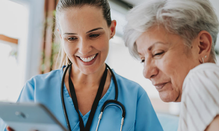 Doctor speaking with patient