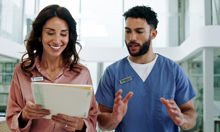 Hospital chief, teamwork and planning with doctor