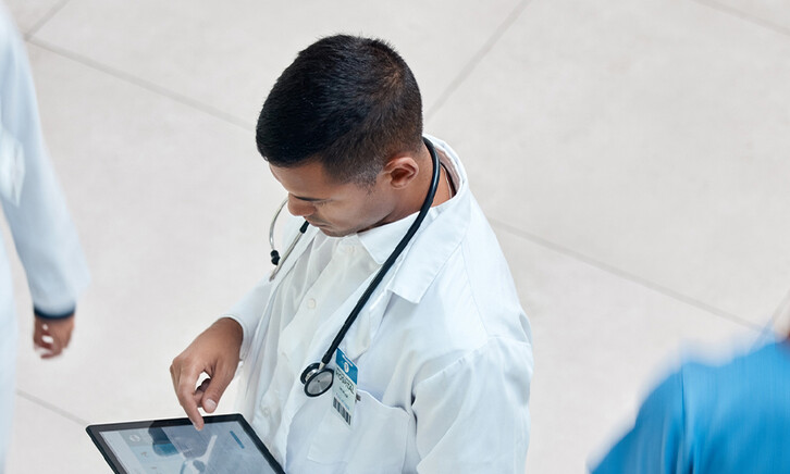 Doctor reviewing health record
