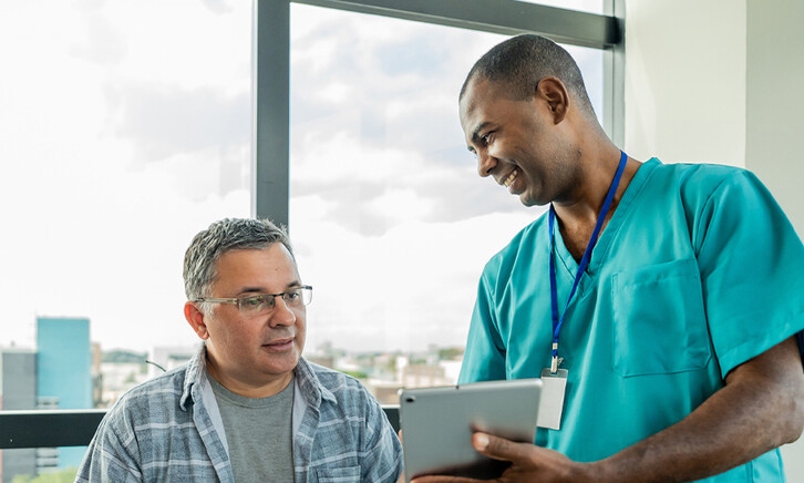 Doctor speaking with patient