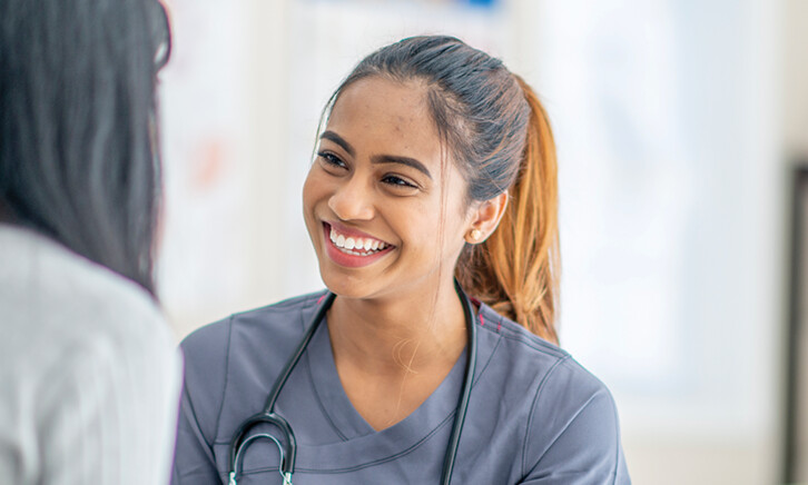 nurse smiling at patient