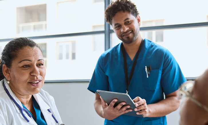 Doctors engaging with patient