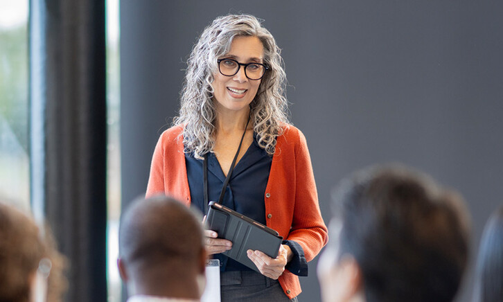 Person presenting at conference