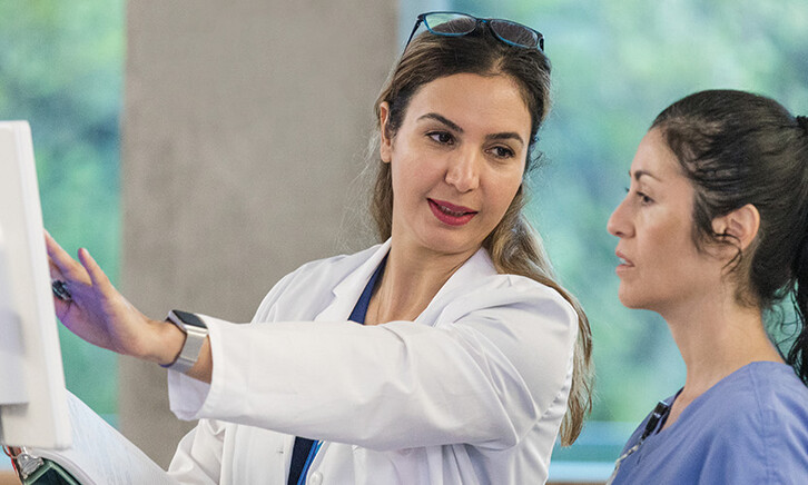 nurse and physician discuss data