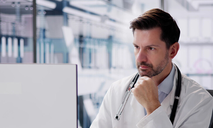 Doctor using computer