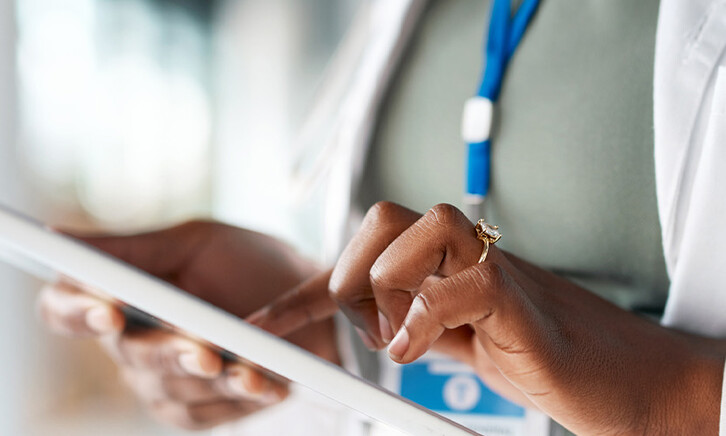 Doctor using tablet