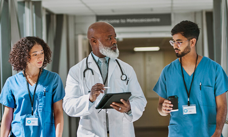 Doctor and nurses talking