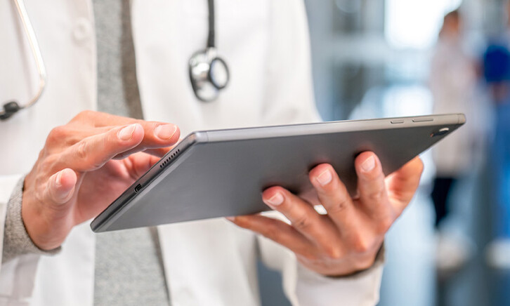 Doctor using tablet