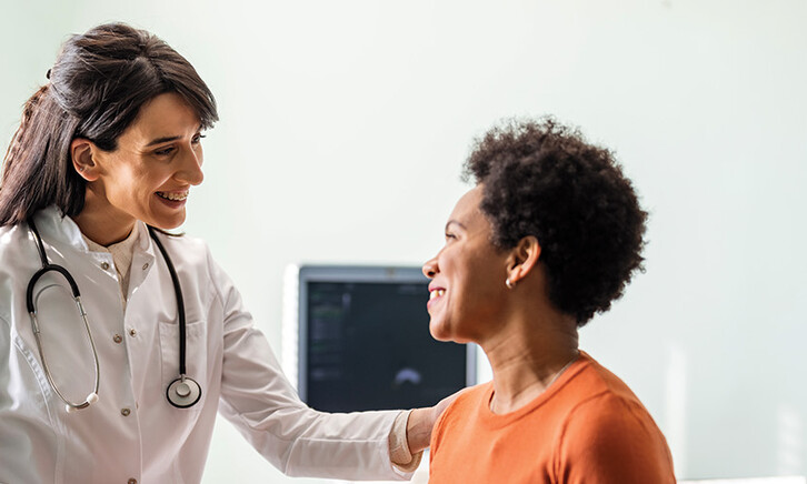 doctor reassures patient