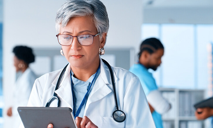 Doctor using tablet