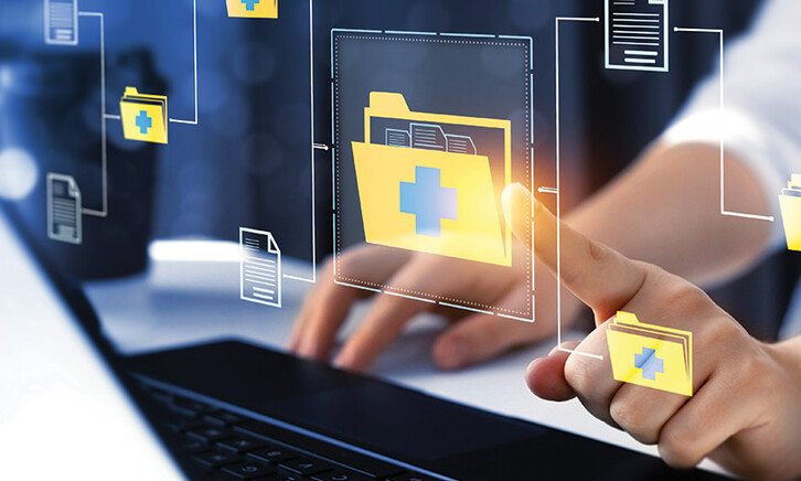 doctor signing into computer folders