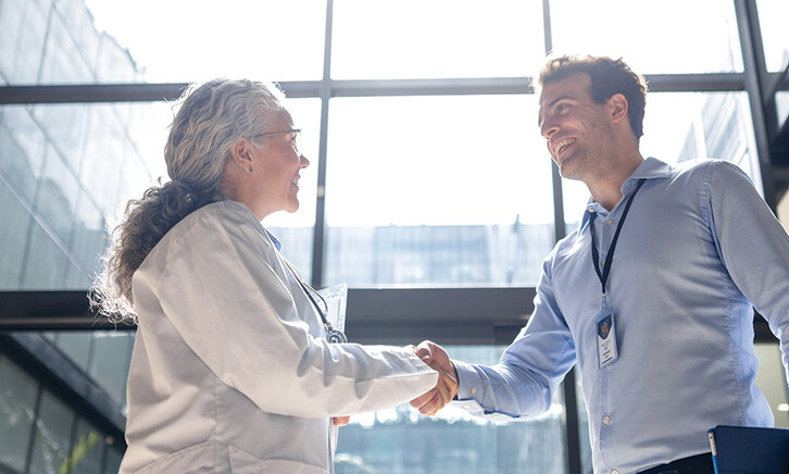 two people shaking hands