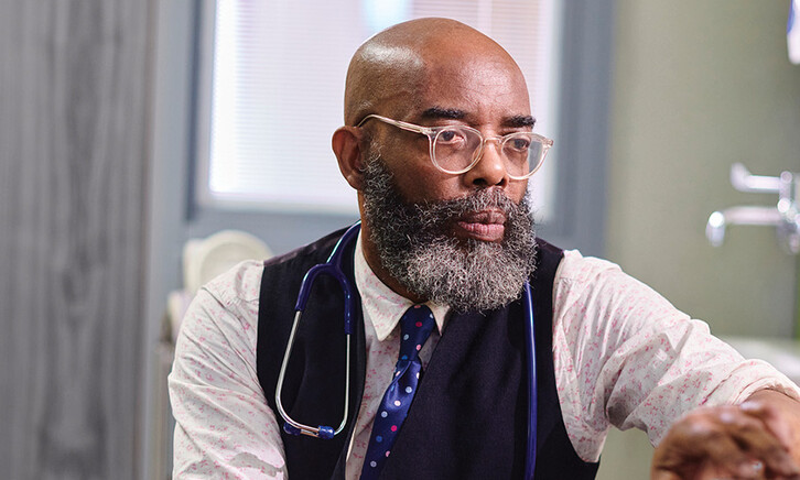 Physician working on a computer