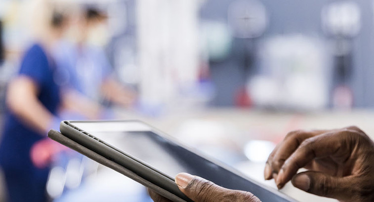Medical worker using tablet