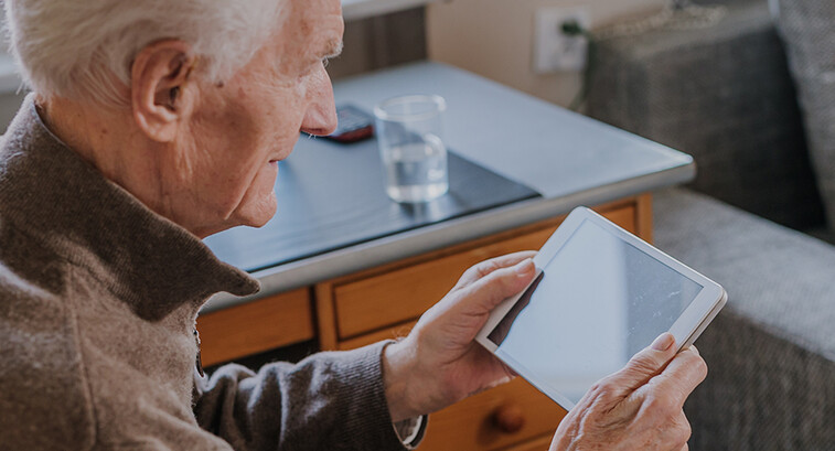 Senior using Digital Tablet