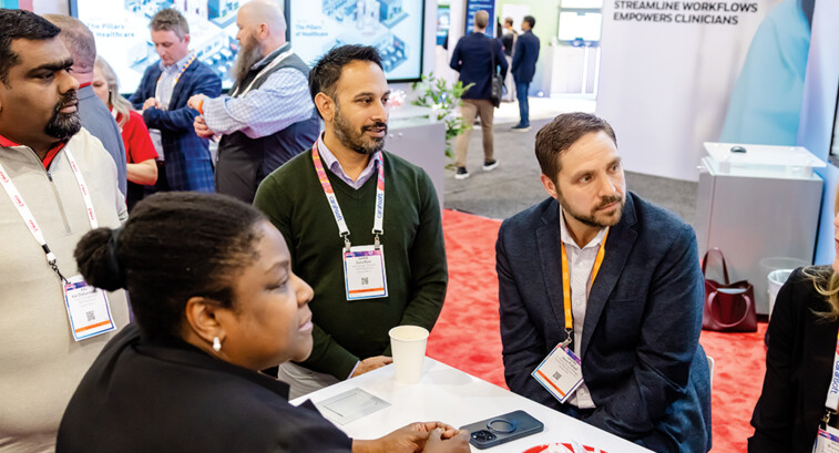 HIMSS25 attendees network on exhibit floor