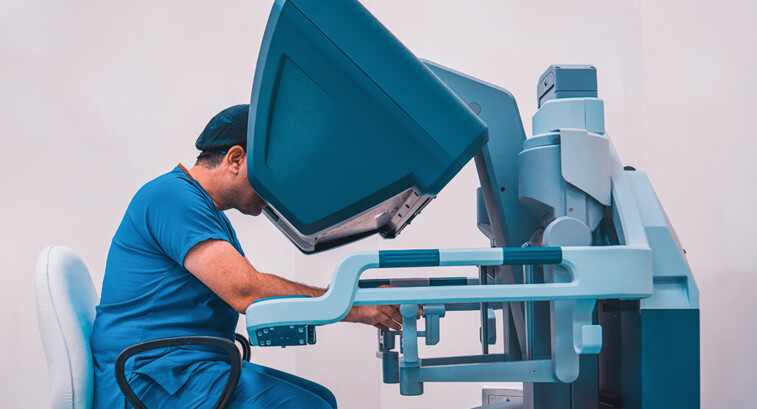 doctor performs telerobotic surgery