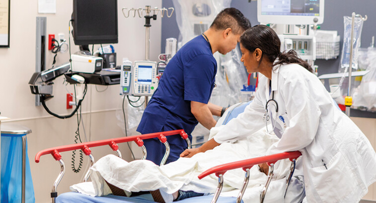 doctors take care of patient in the ER