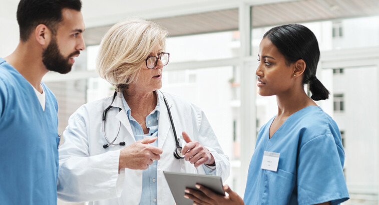 Care Team Collaborates with Data on Tables