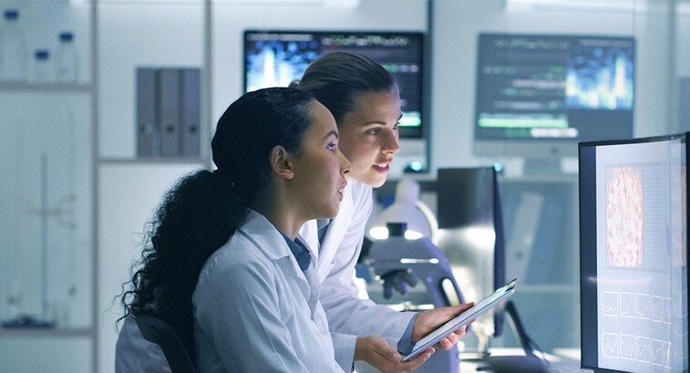 Doctors reviewing information on devices