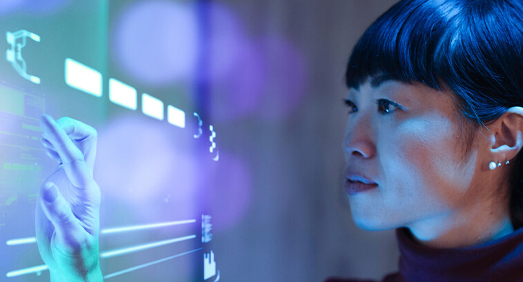Person working with a futuristic computer