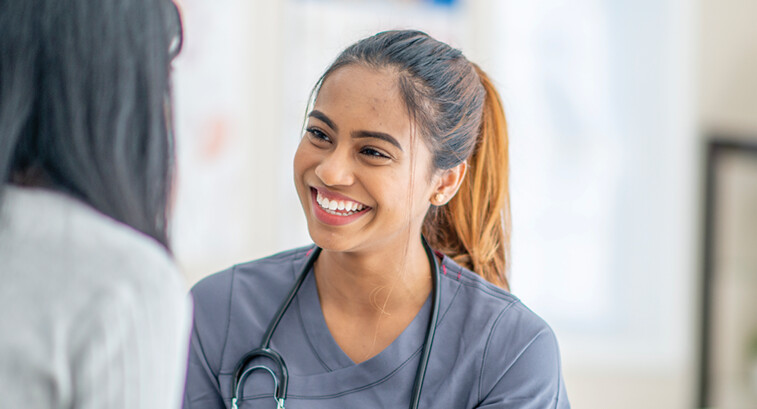 nurse smiling at patient