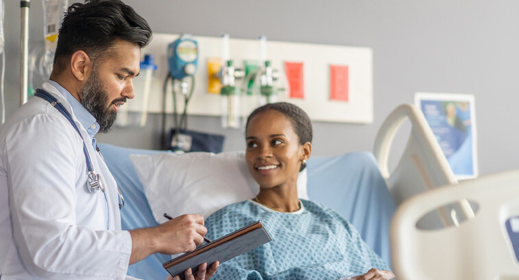 Doctor speaking with patient
