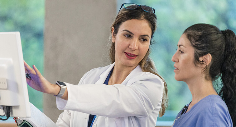 nurse and physician discuss data