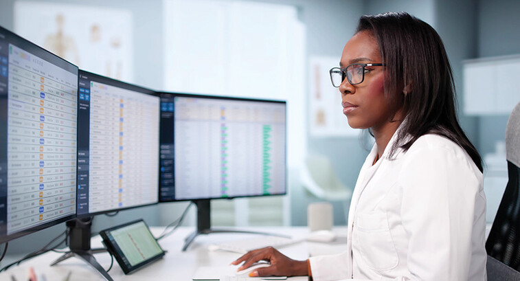 doctor on computer deals with healthcare billing