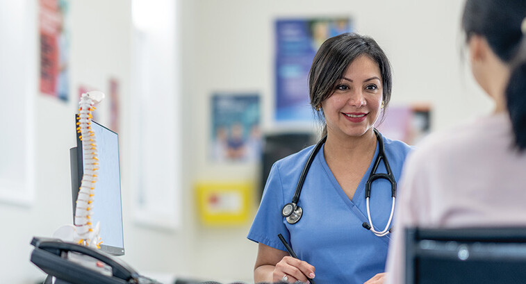 nurse talks to patient