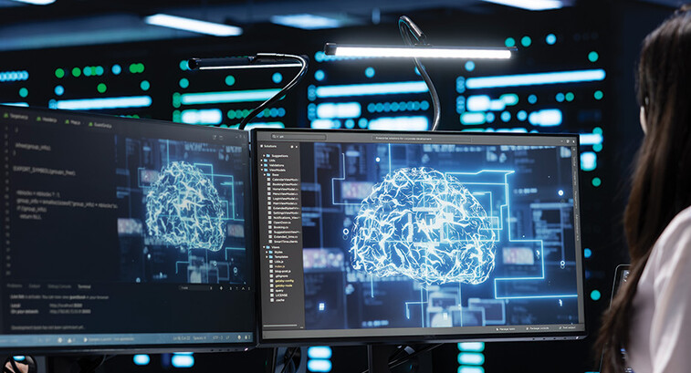 women on computer with digital brain