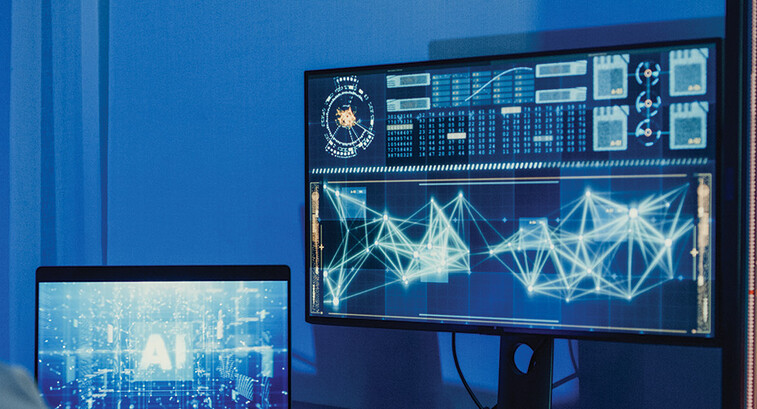 developer works on AI algorithm on multiple monitors