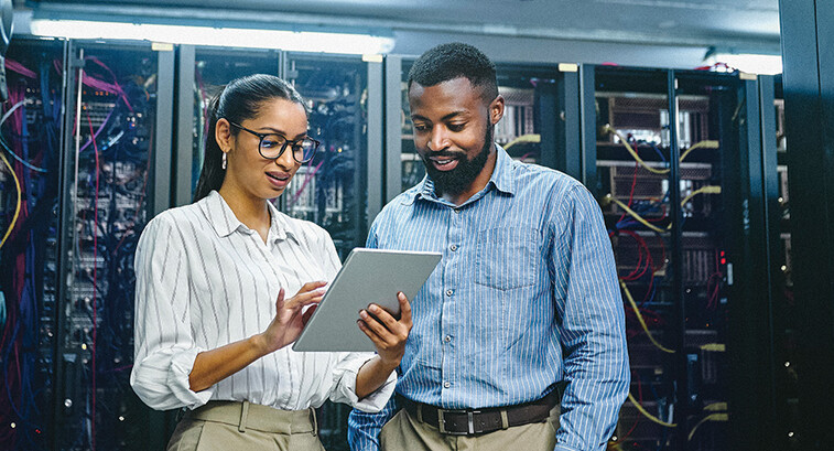 IT specialists collaborate in data center