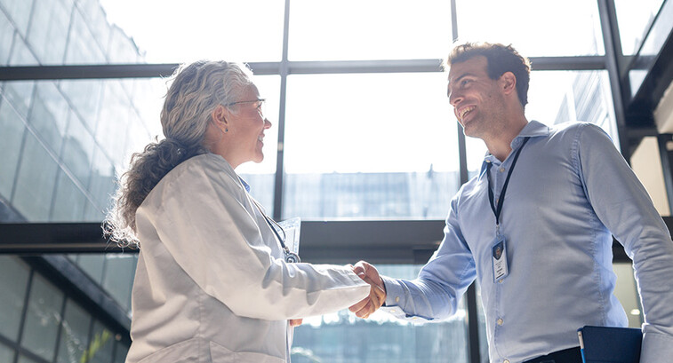 two people shaking hands