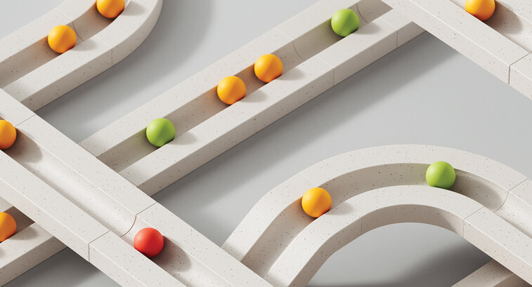 colorful marbles move through white paths