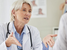 Doctor at concierge medicine clinic does a patient consult