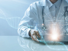 doctor views digital health data on tablet concept