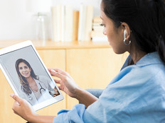 Woman has telehealth consultation with her doctor