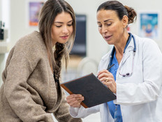 Patient speaking with doctor