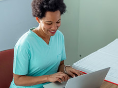 Doctor using computer in hospital