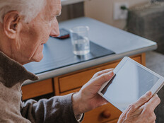 Senior using Digital Tablet