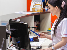 Nurse using a computer at a hospital