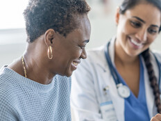 Doctor speaking with patient