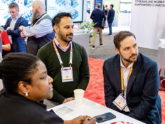 HIMSS25 attendees network on exhibit floor