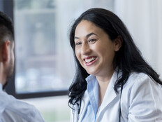 Doctor conversing with patient