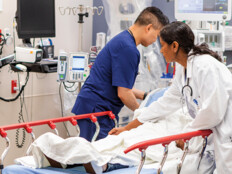 doctors take care of patient in the ER